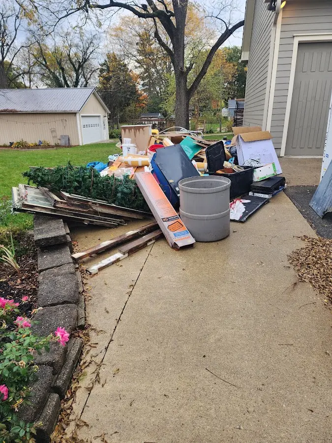 Dumpster being loaded with debris for 3 Yard Dumpster Rental in Pennsburg